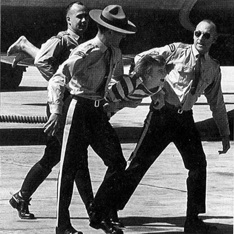 Bruce Decker being carried away
